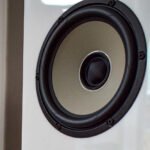 front and close view of Test compact speaker Progressive Audio